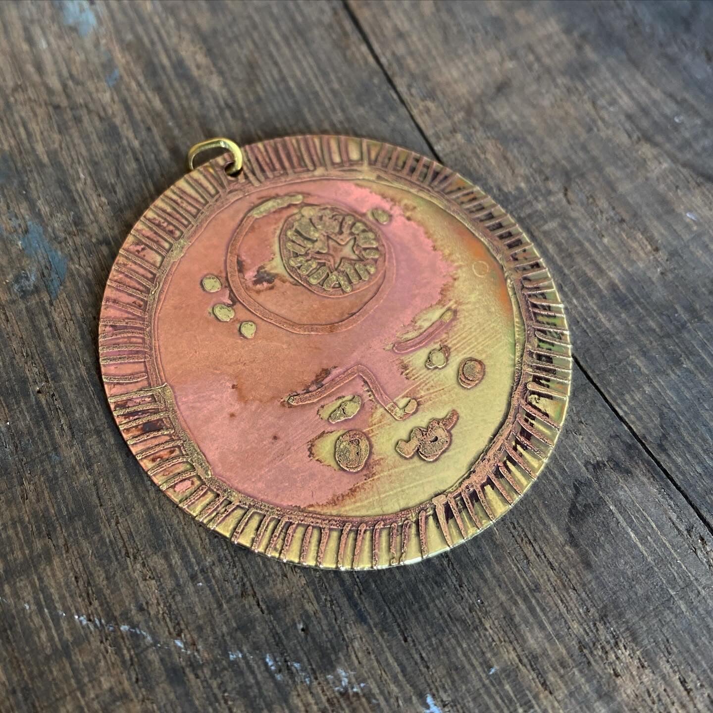 SISTER SUN 5 Brass pendant on blue cord