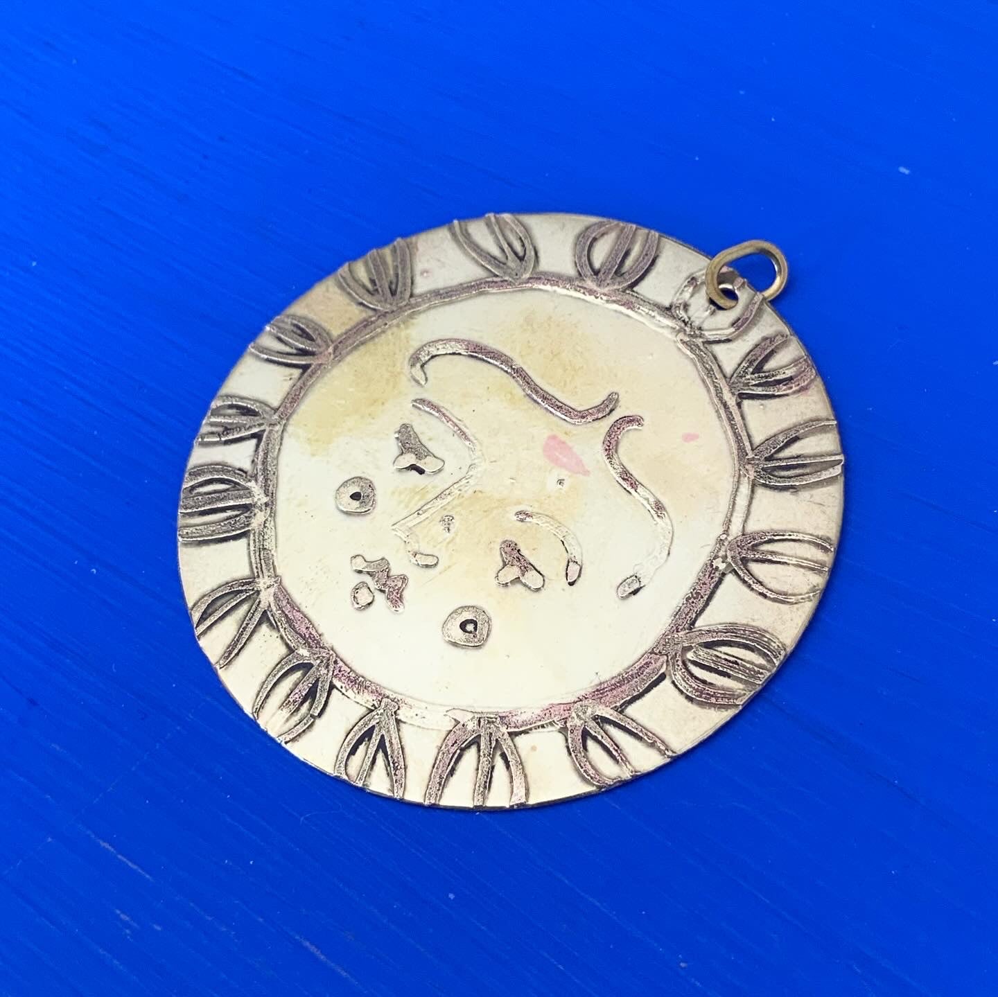 SISTER SUN 30 Brass pendant on blue cord