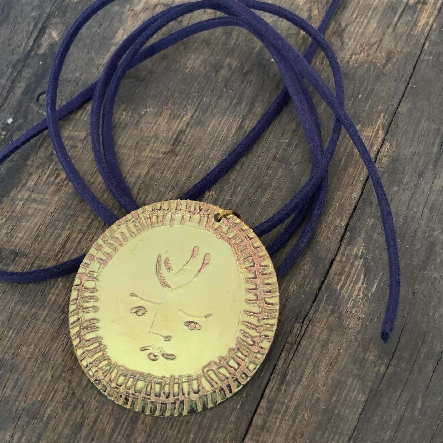 SISTER SUN 18 Brass pendant on blue cord