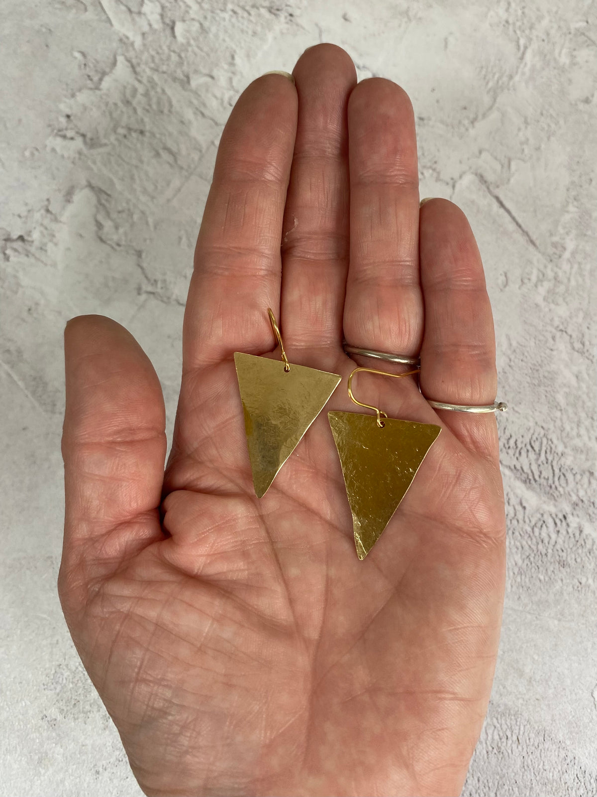 Isosceles Earrings in Raw Brass