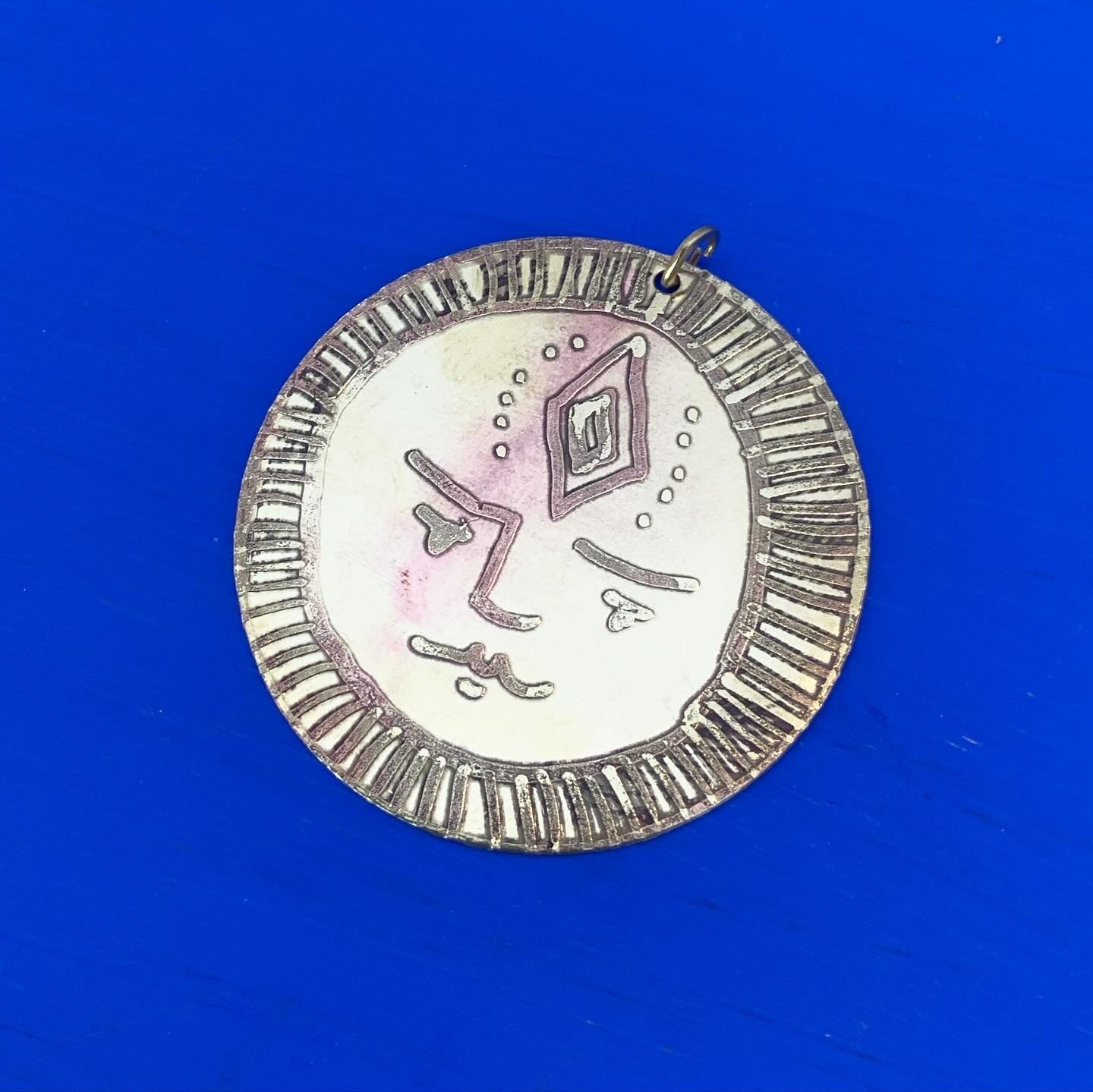 SISTER SUN 13 Brass pendant on blue cord