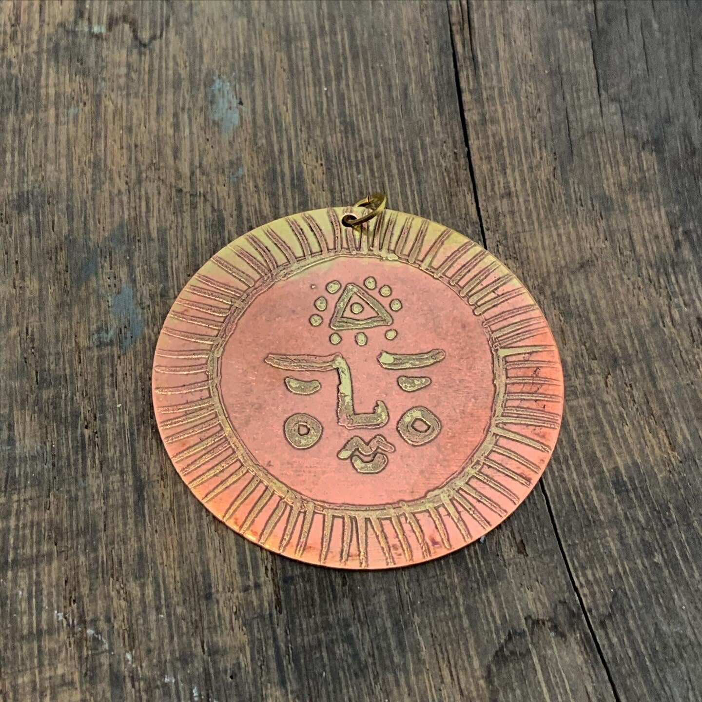 SISTER SUN 20 Brass pendant on blue cord