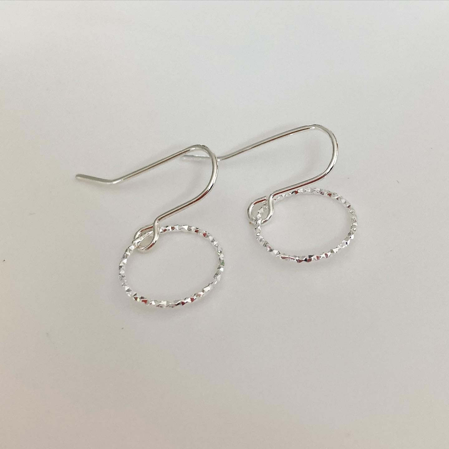 Sterling Silver Diamond Cut Tiny Hoop Earrings