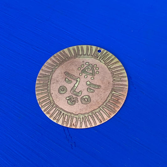 SISTER SUN 20 Brass pendant on blue cord