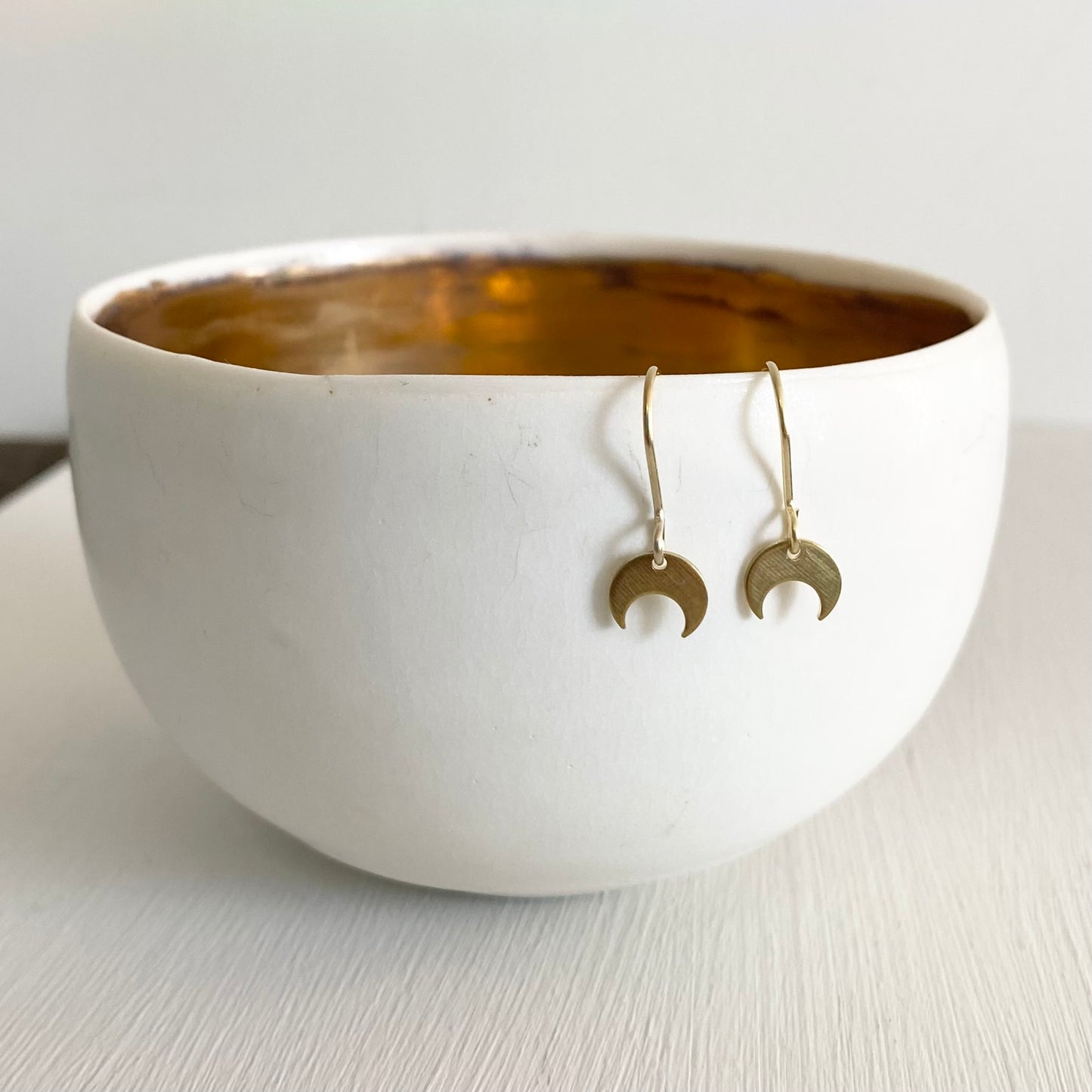 Tiny Moon Earrings in Brass