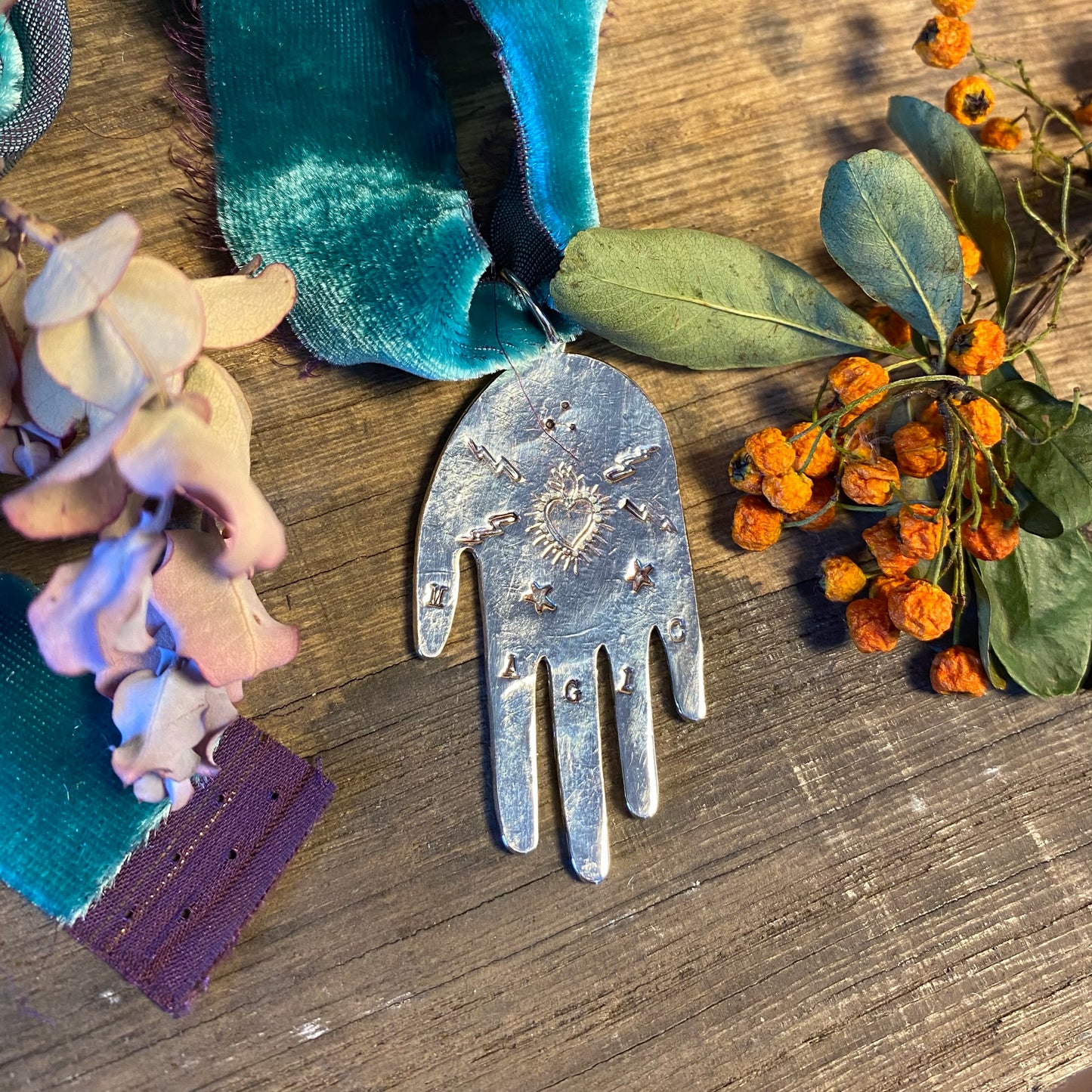 MAGIC Hand Pendant on Velvet